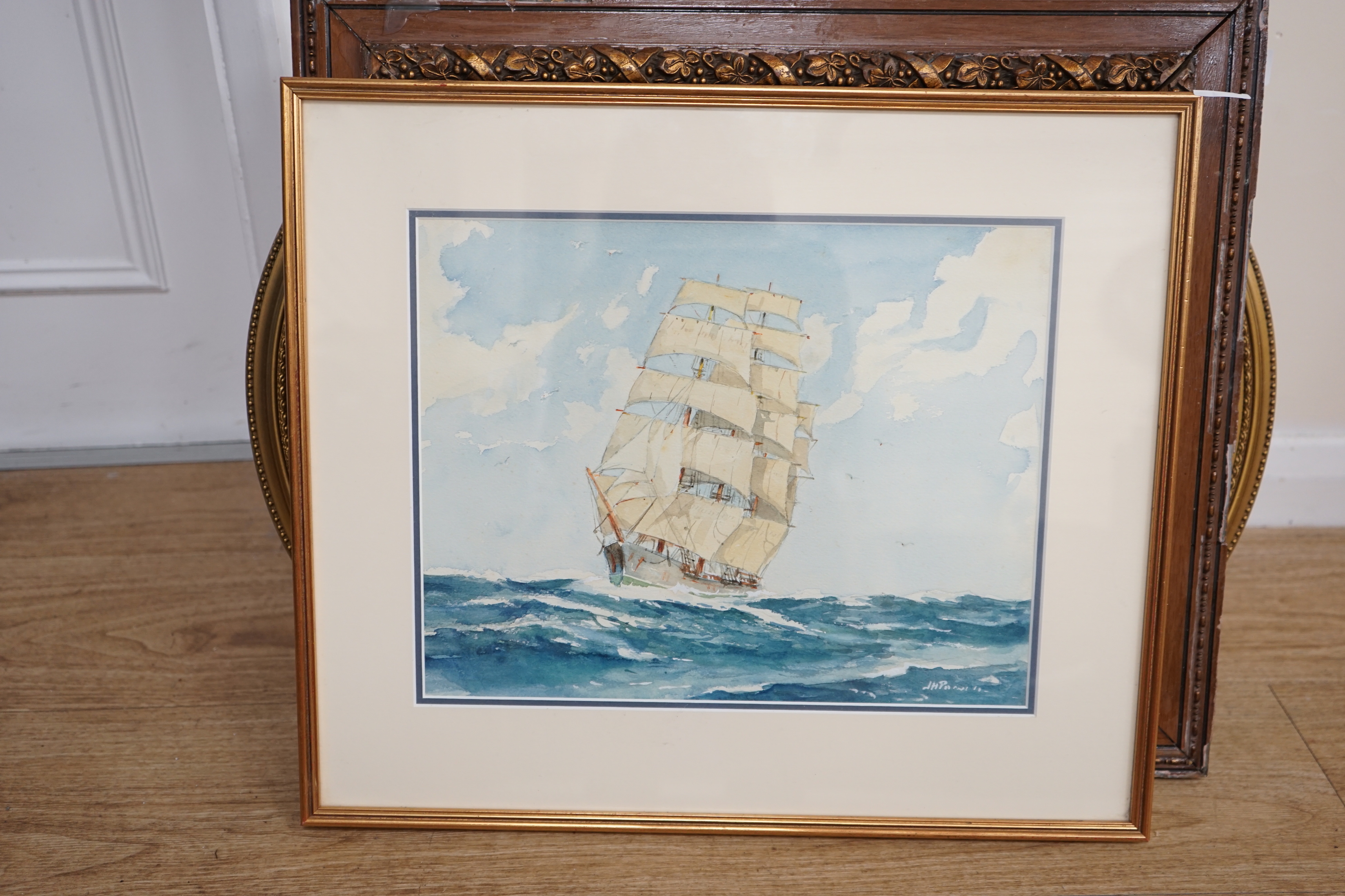 J H Powell (20th. C) heightened watercolour, Ship at sea, signed, 27 x 35cm